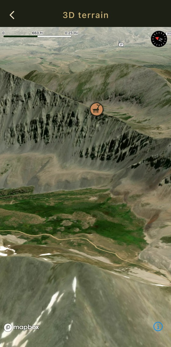 The 3D map in HelioMaps, titled 3D terrain: satellite imagery of a steep mountain ridge with patches of timber and snow, tilted at an angle, with an elk pin on the ridge line, a scale bar of 660 ft and 0.25 mi, and a compass.